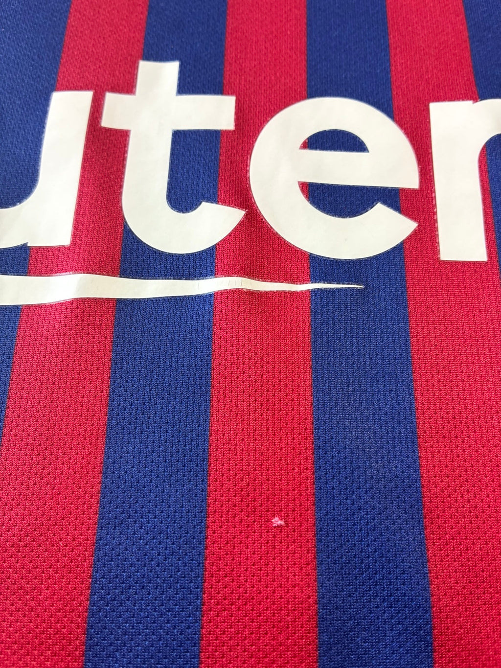 Detail of 2018/19 FC Barcelona home jersey fabric and Rakuten sponsor