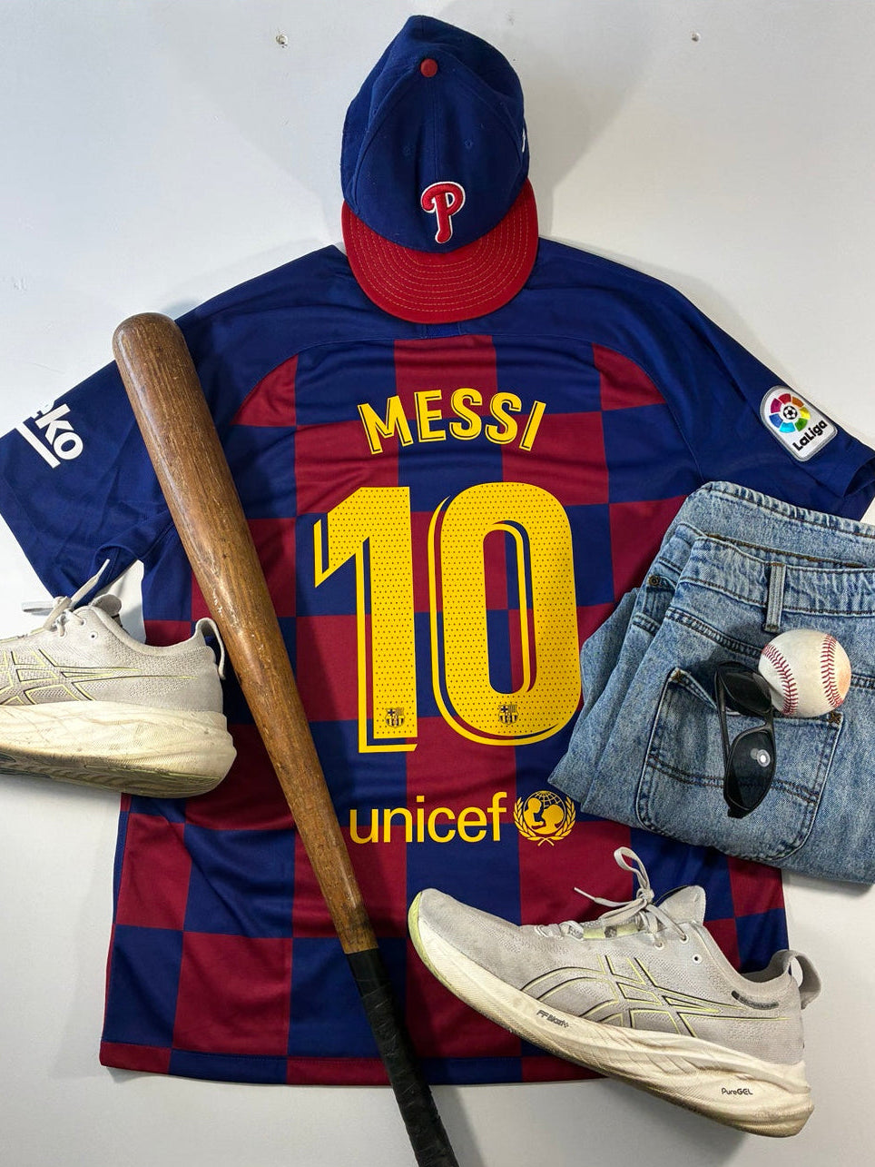 2019/20 FC Barcelona Lionel Messi #10 XL jersey styled flat lay with baseball accessories