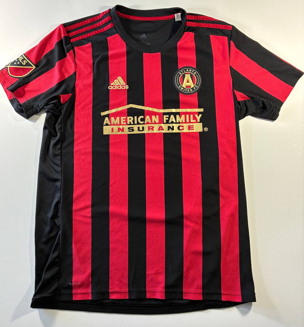 Atlanta United red and black home shirt — front