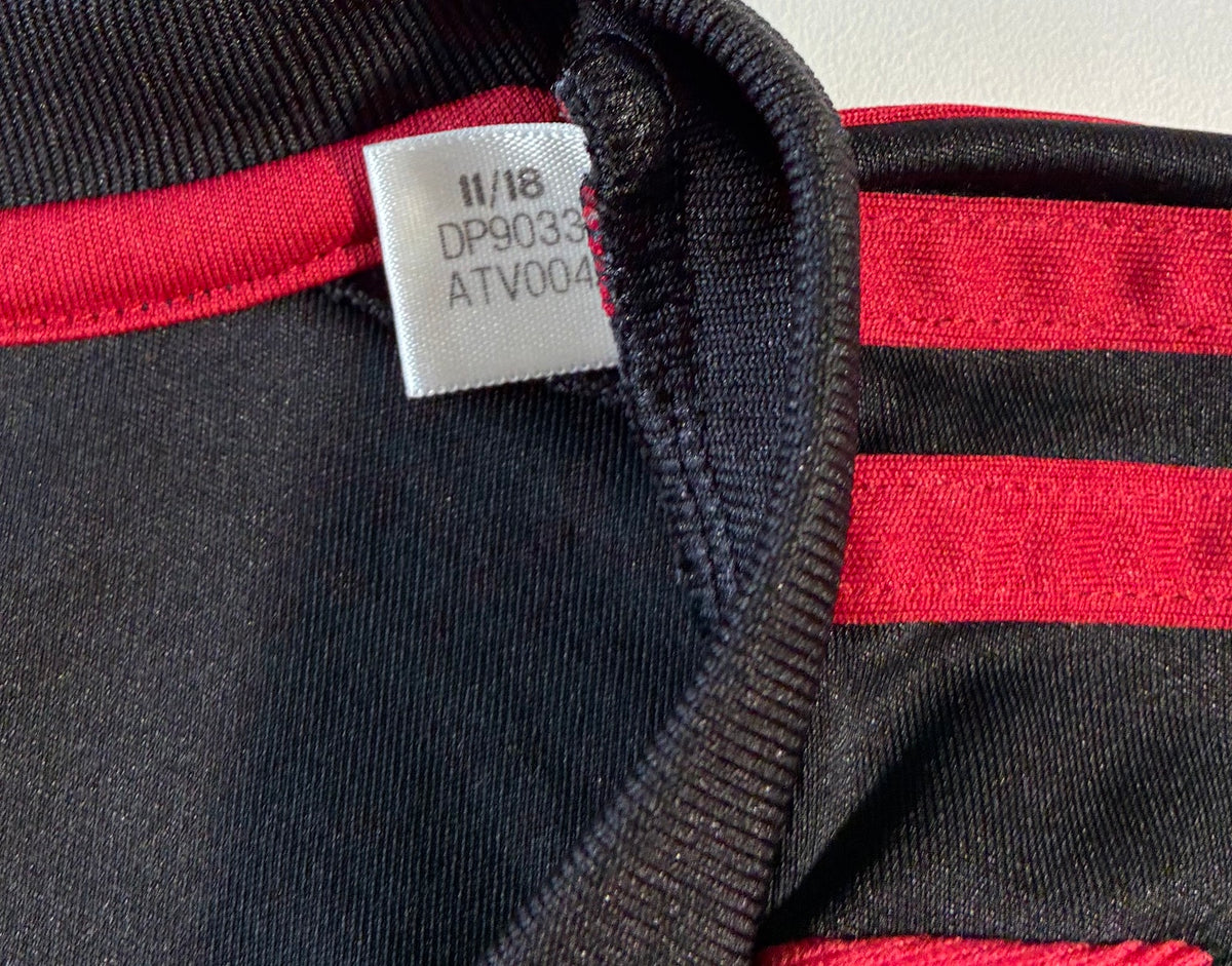 Atlanta United red and black home shirt — label detail