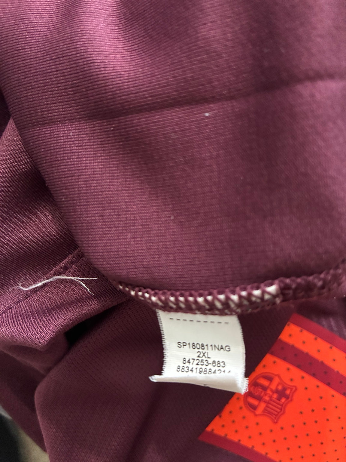Nike inner size and product code tag showing XXL and 847253-683 on Lionel Messi 2017-18 FC Barcelona third jersey