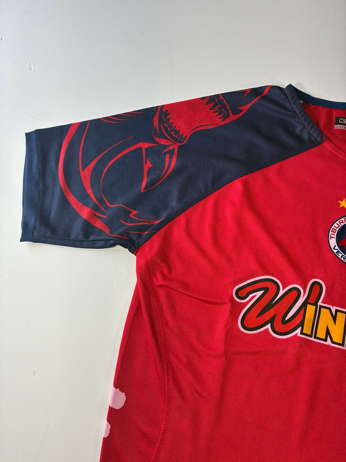 Tiburones Rojos de Veracruz 2013-14 Kappa home jersey navy and red shark shoulder graphic detail